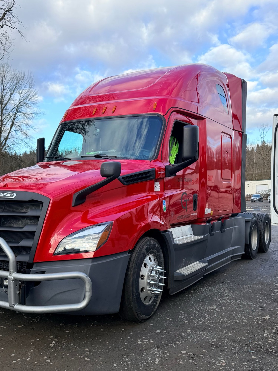 Guru Trucking red Freightliner Cascadia